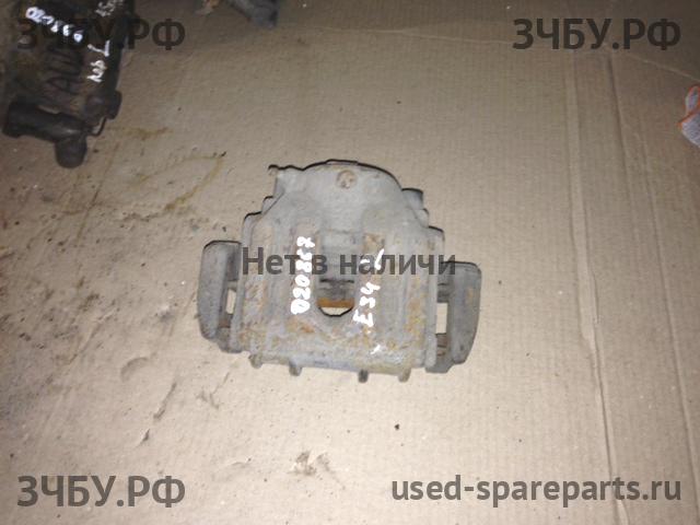 BMW 5-series E34 Суппорт передний правый (в сборе со скобой)