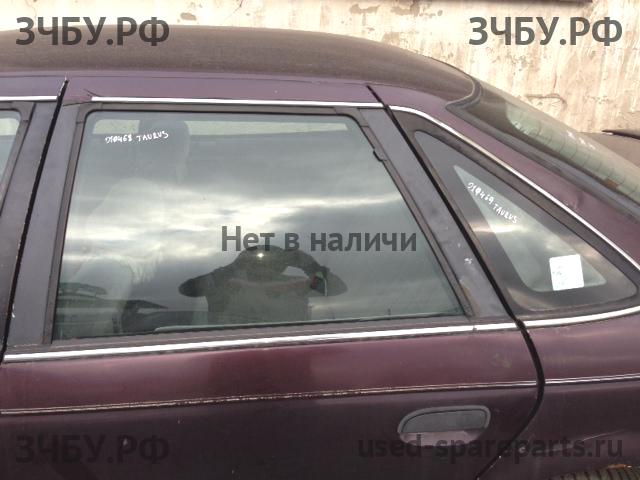 Ford Taurus 1 Стекло кузовное глухое левое