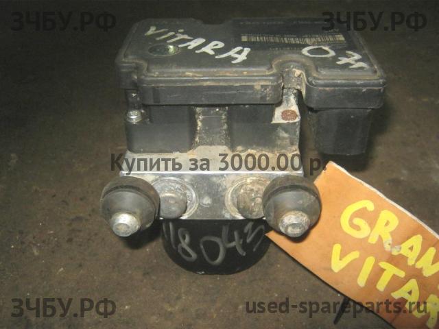 Suzuki Grand Vitara 2 (HT) Блок ABS (насос)